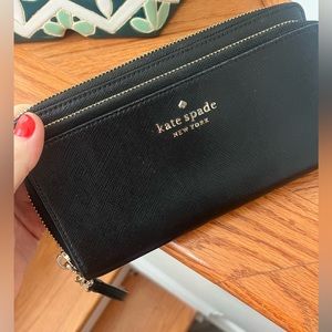 Gently used kate spade wallet gold and black